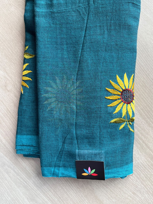 Crystal Teal Floral Embroidered Feather Light Mul Cotton Saree (Without Blouse) - 36514